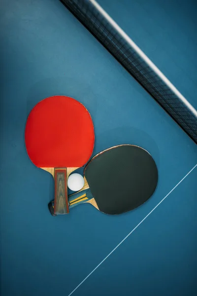 table tennis rackets and ball