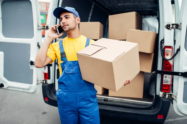 Male courier in uniform — Stock Photo, Image