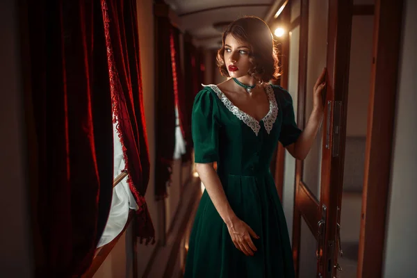 Young woman travelling in retro train — Stock Photo, Image