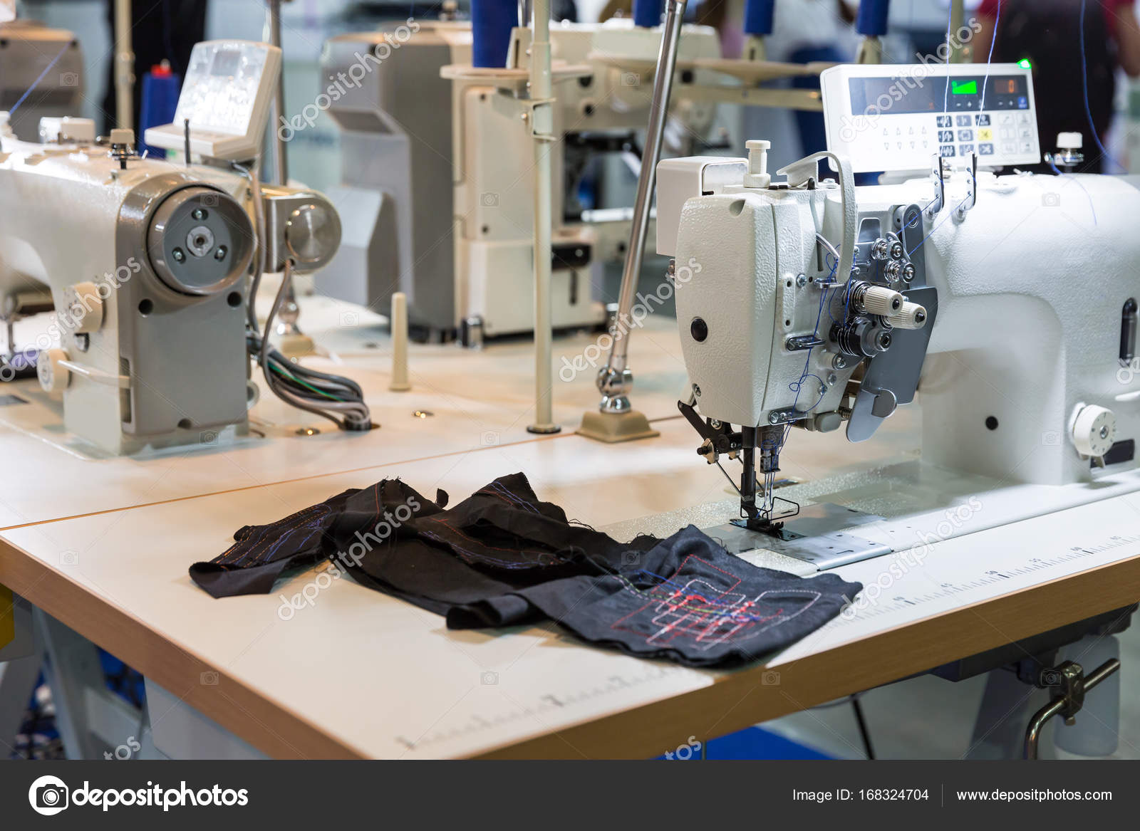 Professional sewing machine and textile Stock Photo by ©Nomadsoul1