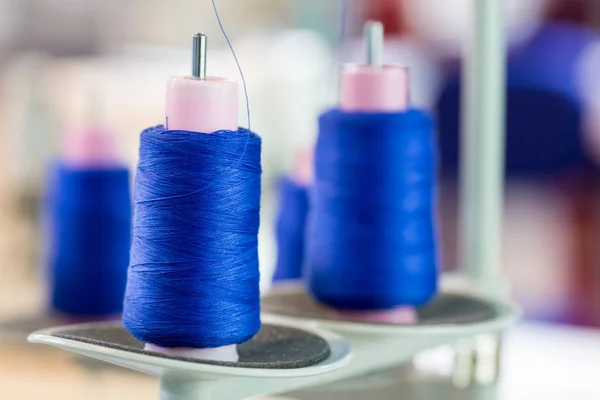 Spools of threads on sewing machine — Stock Photo, Image
