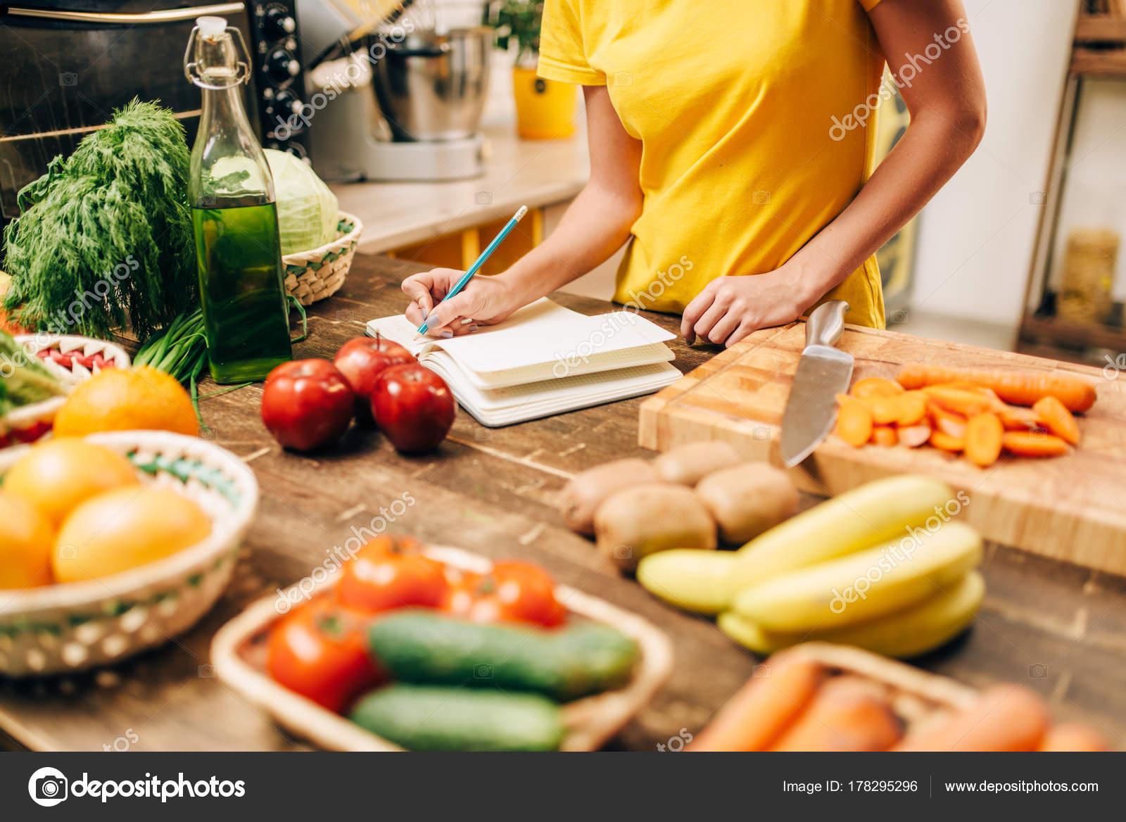 Young Woman Cooking Kitchen Writing Recipe Book Healthy ...