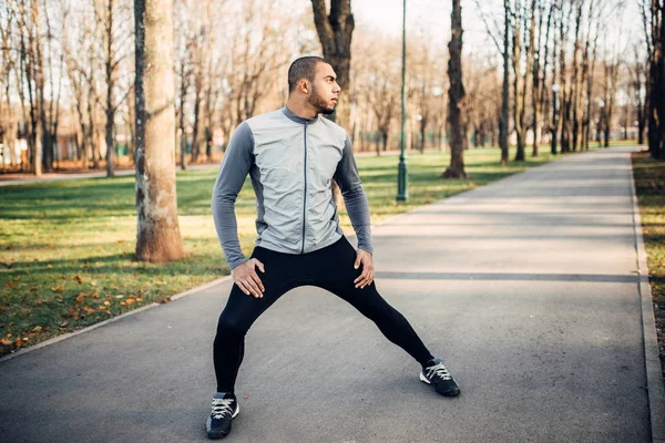 Male Sportsman Stretching Running Autumn Park — Stock Photo, Image