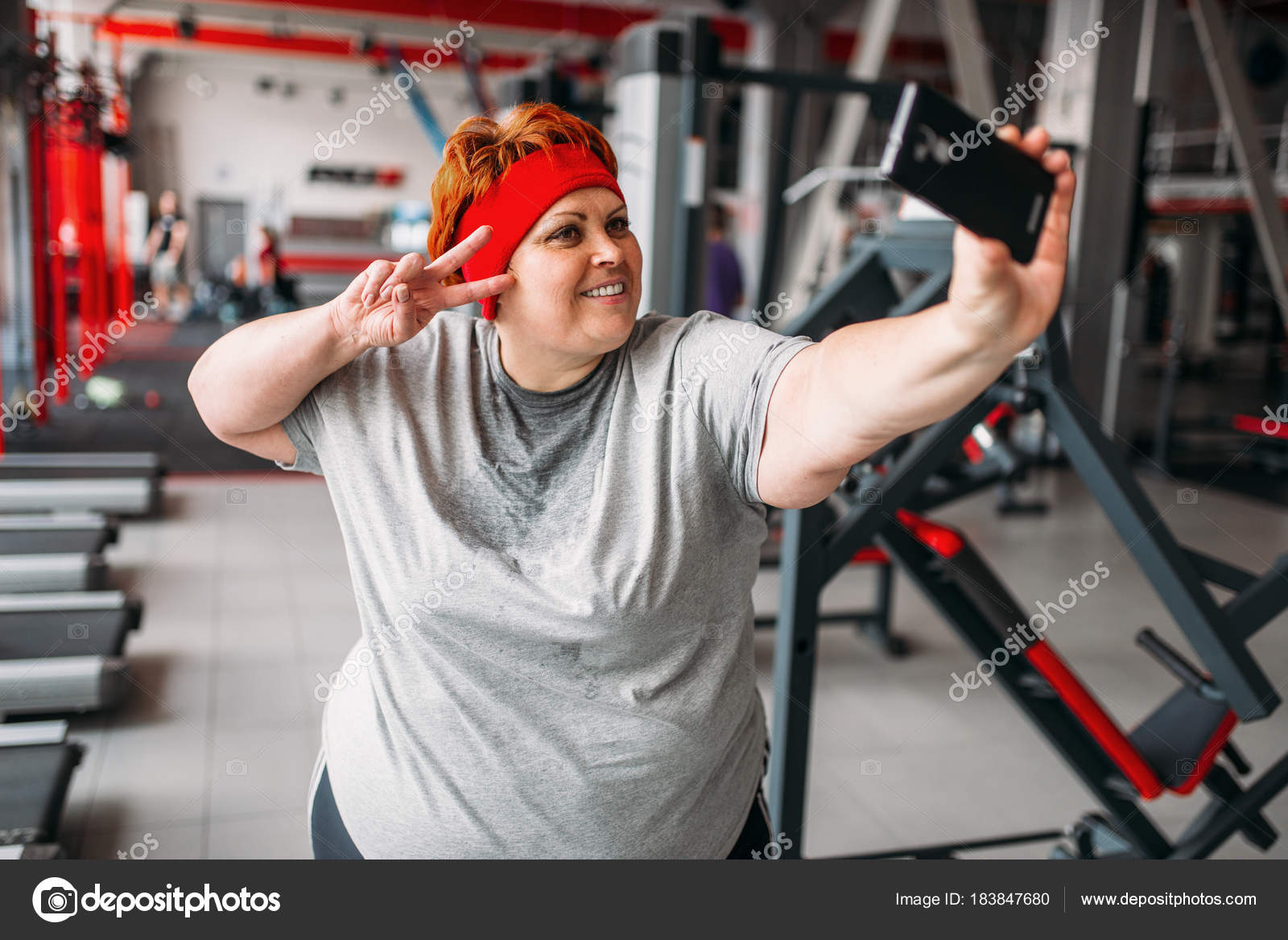 depositphotos_183847680-stock-photo-fat-sweaty-woman-taking-selfie.jpg