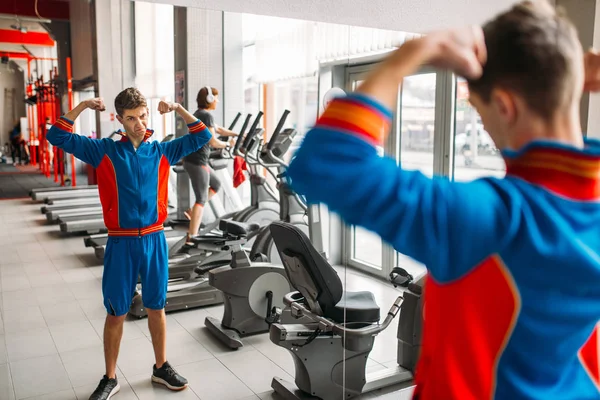 Weak Skinny Man Wearing Sportswear Showing Muscles Gym — Stock Photo, Image