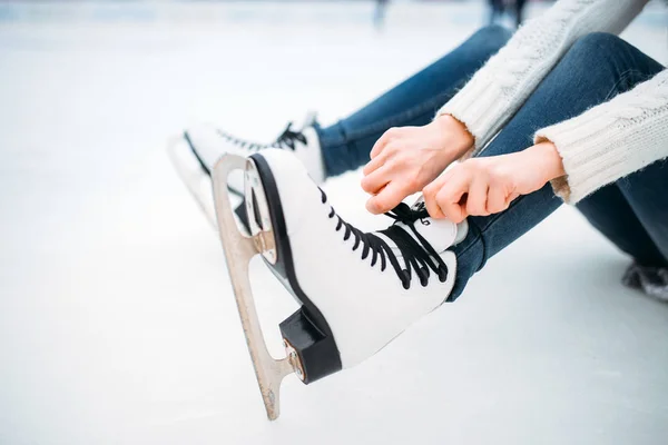 Young Woman Sitting Ice Tying Shoelaces Skates Skating Rink — Stock Photo, Image