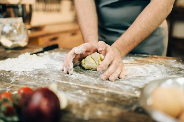 Man Apron Works Dough Wooden Kitchen Table — Stock Photo, Image