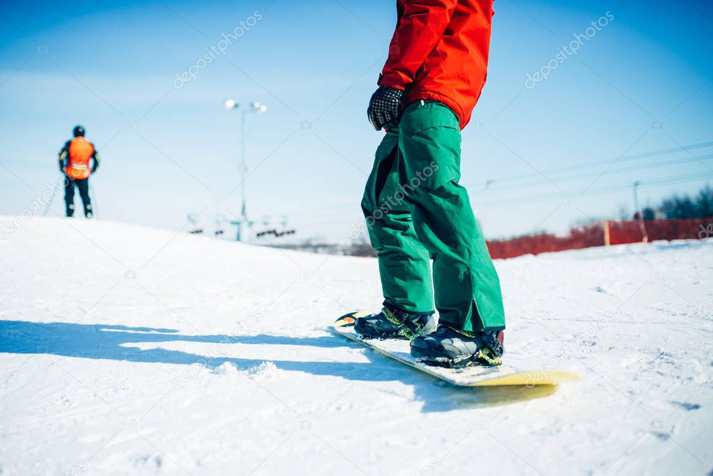 snowboarder with board, snowy mountains on background, winter active sport, extreme lifestyle, snowboarding
