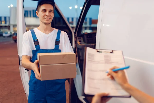 Deliveryman Uniform Gives Parcel Female Recipient Car Delivery Service Man — Stock Photo, Image