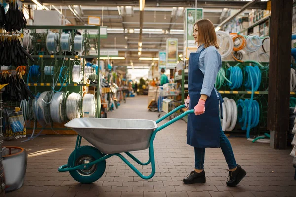 Female Seller Apron Holds Garden Cart Shop Gardeners Woman Sells — Stock Photo, Image