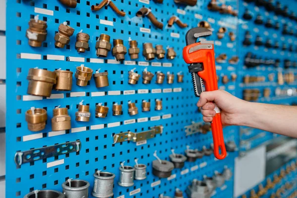 Plumber Hand Holds Pipe Wrench Showcase Plumbering Store Man Buying — 스톡 사진