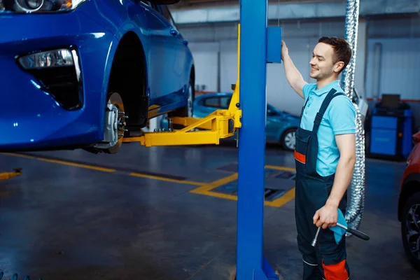 Repairman Uniform Lifts Vehicle Car Service Station Automobile Checking Inspection — Stock Photo, Image