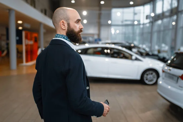 Smiling Man Poses Car Dealership Customer New Vehicle Showroom Male — Stock Photo, Image