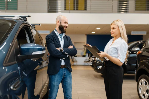 Smiling Man Saleswoman Car Dealership Customer Seller Vehicle Showroom Male — Stockfoto