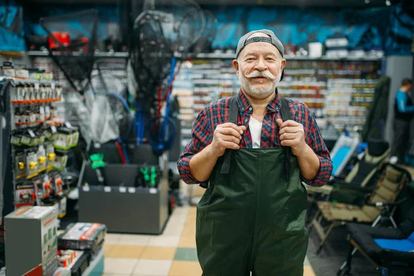 Pêcheur Essaie Sur Combinaison Caoutchouc Dans Magasin Pêche Crochets Boules — Photo