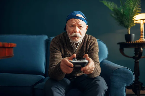 Elderly Man Joystick Plays Game Console Couch Bearded Mature Senior — Stock Photo, Image