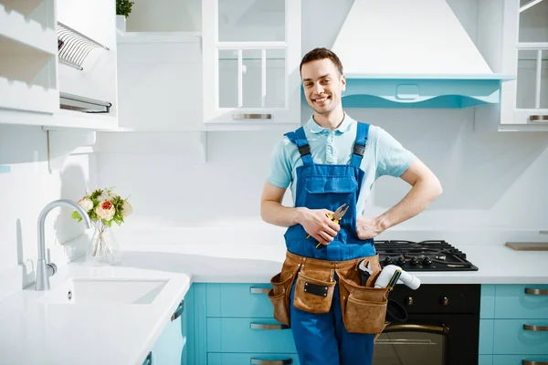 Cheerful Male Plumber Uniform Poses Kitchen Handyman Toolbag Repair Sink — Stock Photo, Image