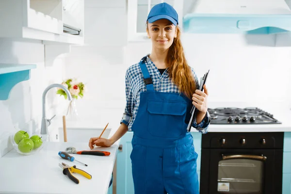 Cute Female Furniture Maker Uniform Holds Notebook Kitchen Handywoman Fixing — Stock Photo, Image