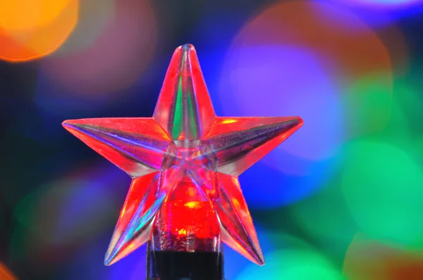 Bombilla roja en forma de estrella — Foto de Stock