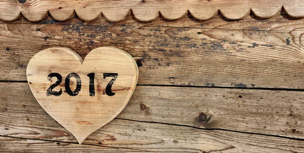 2017 on heart-shaped wood — Stock Photo, Image