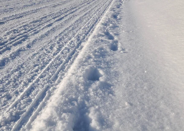 Nieve en un camino — Foto de Stock