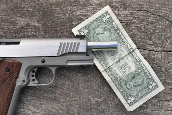 gun and money