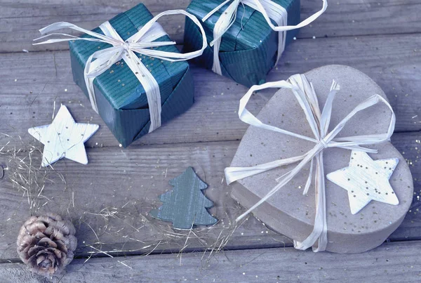 Christmas gift and heart-shaped box — Stock Photo, Image