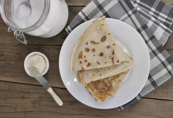 French pancakes with butter and sugar — Stock Photo, Image