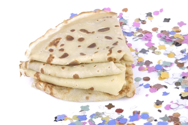 French pancakes on confetti — Stock Photo, Image