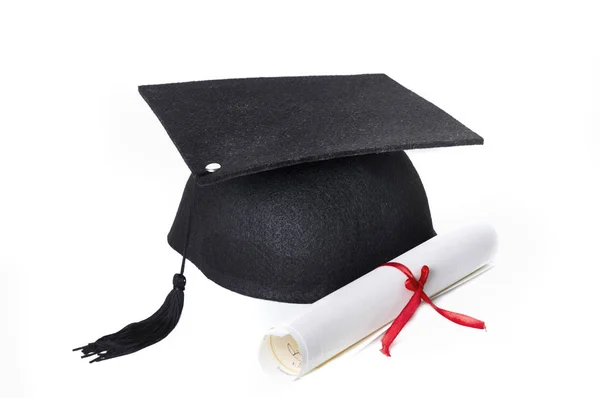 Graduate rolled and black hat — Stock Photo, Image