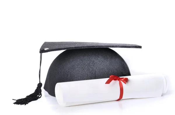 Graduate rolled and black hat — Stock Photo, Image