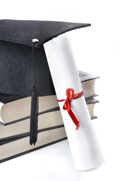 Graduate rolled, books and hat — Stock Photo, Image