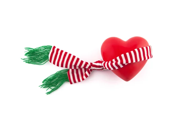 Red heart wrapped in a scarf — Stock Photo, Image