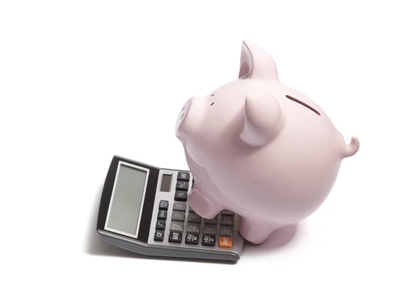 Cálculo financeiro. Banco porquinho com calculadora — Fotografia de Stock