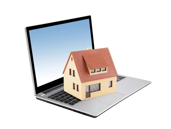 House on laptop isolated on white — Stock Photo, Image