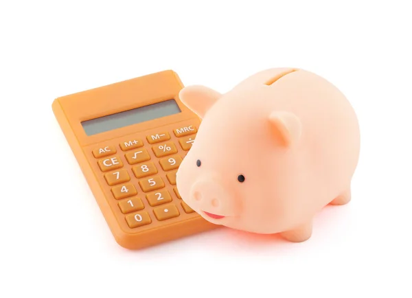 Банк свиней с оранжевым калькулятором — стоковое фото
