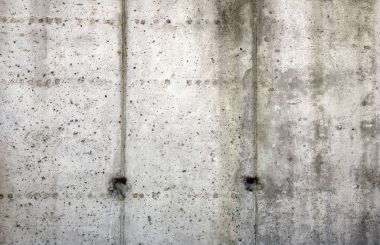 Eski kirli doku, gri beton duvar 
