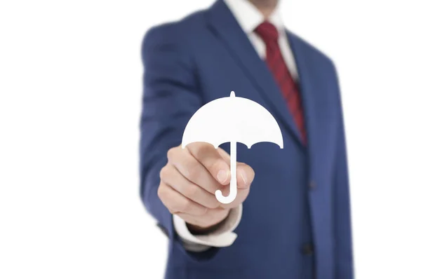 Empresario con forma de paraguas aislado sobre fondo blanco — Foto de Stock