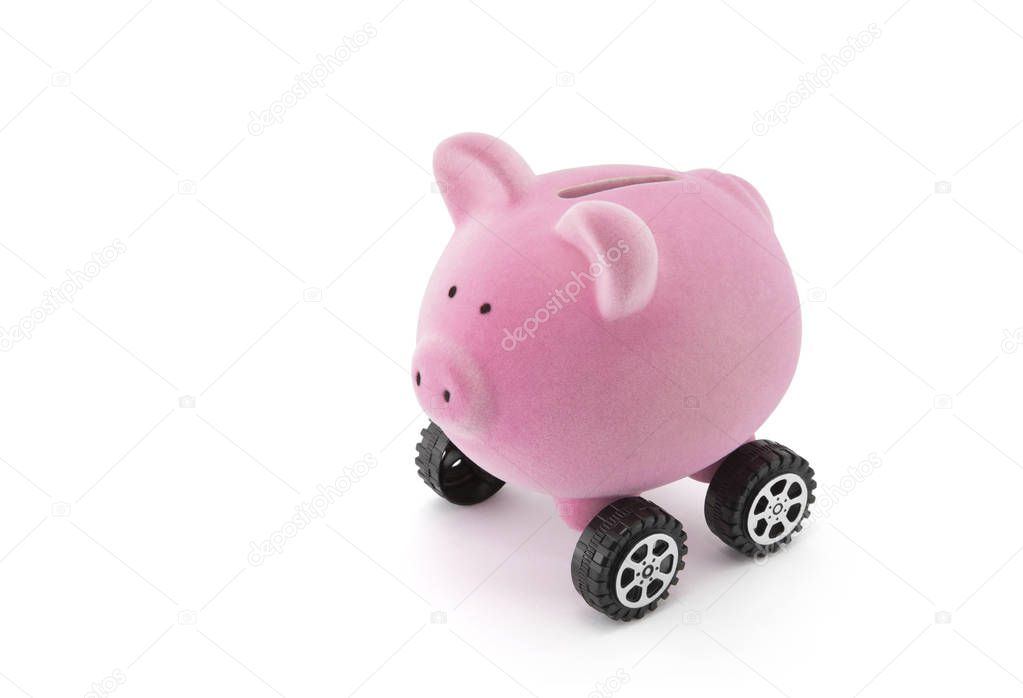 Piggy bank on wheels isolated on white with clipping path 