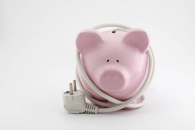 Energy Savings concept. Piggy bank with power plug.  clipart