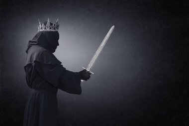 Ghost of a queen or king with medieval sword in the dark