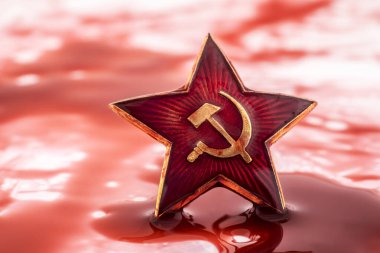 Soviet red star badge in blood clipart