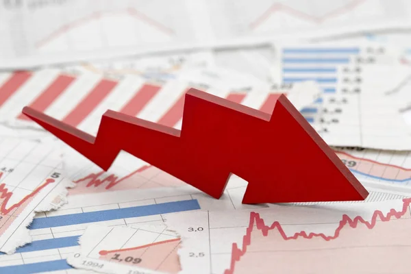 Financial Crisis Concept Falling Red Arrow Financial Charts Newspapers — Stock Photo, Image