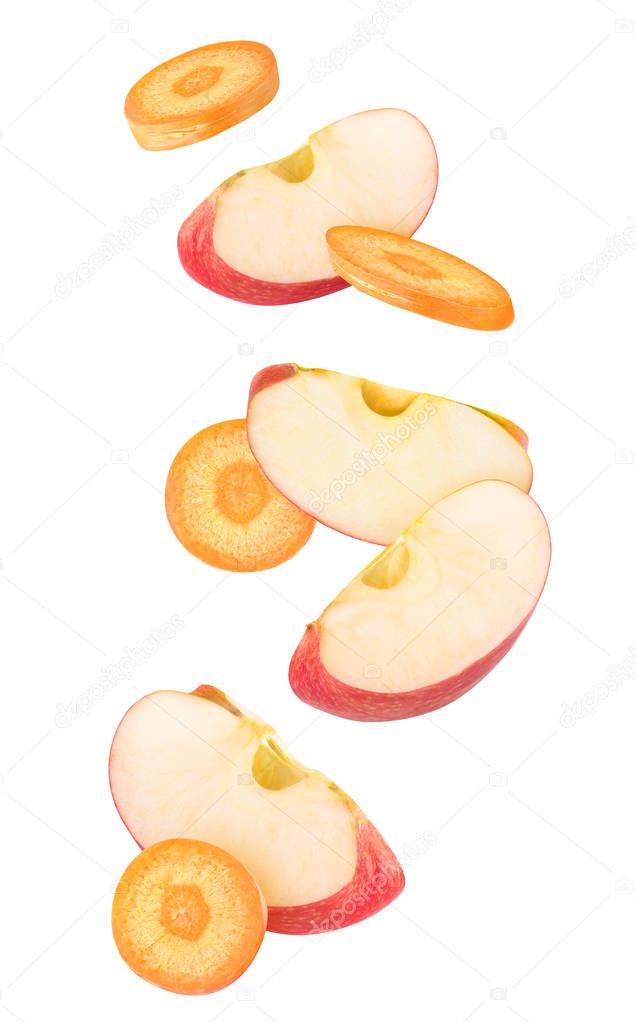 Isolated slices of apple and carrot