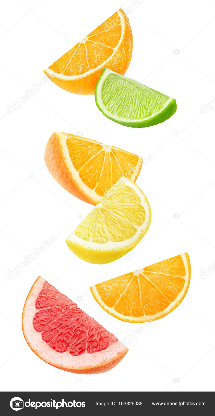 Isolated falling citrus pieces Stock Photo by ©photomaru 163826038