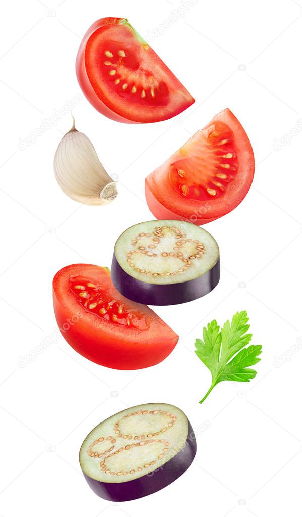 Falling slices of tomato and eggplant