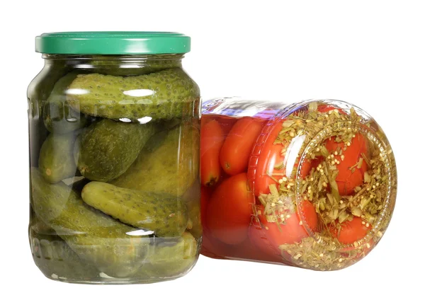 Canned tomatoes and cucumbers on a white background — Stock Photo, Image