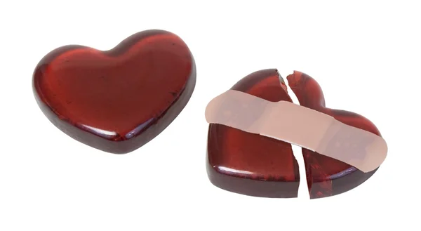 Broken Red Glass Heart Mended with a Bandage — Stock Photo, Image