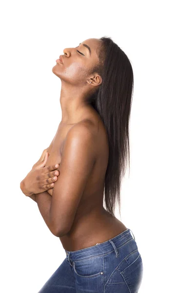 Une jeune femme posant seins nus — Photo