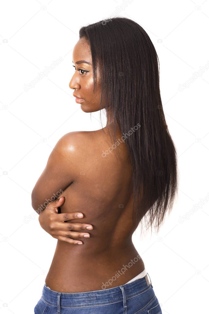 young african american woman posing topless showing her back